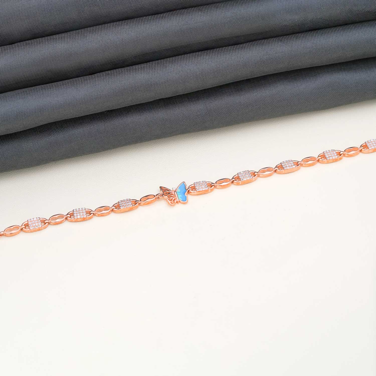 92.5 Sterling Silver with Rose Gold Polished Charm Butterfly bracelet Ivanah Silver