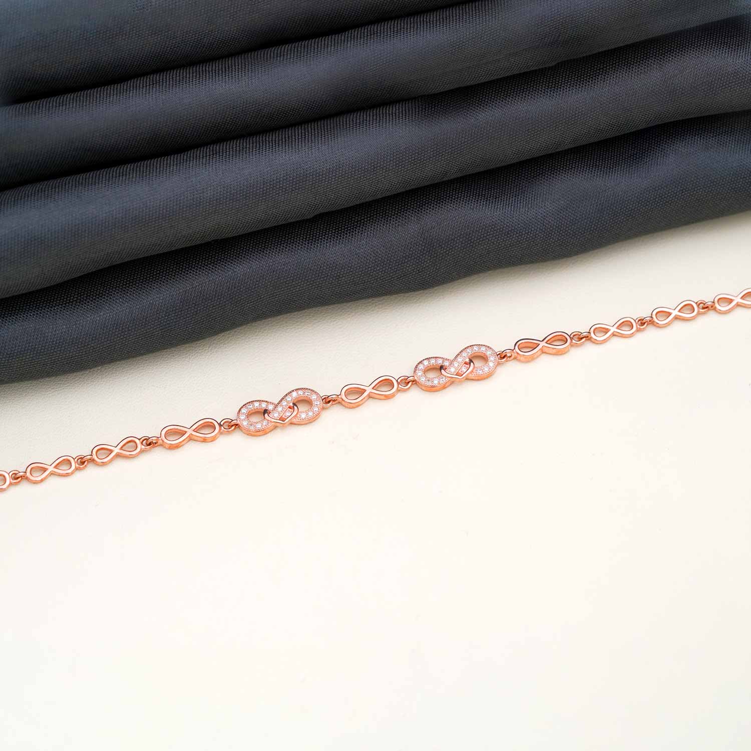92.5 Sterling Silver with Rose Gold Polished Infinity charm bracelet Ivanah Silver