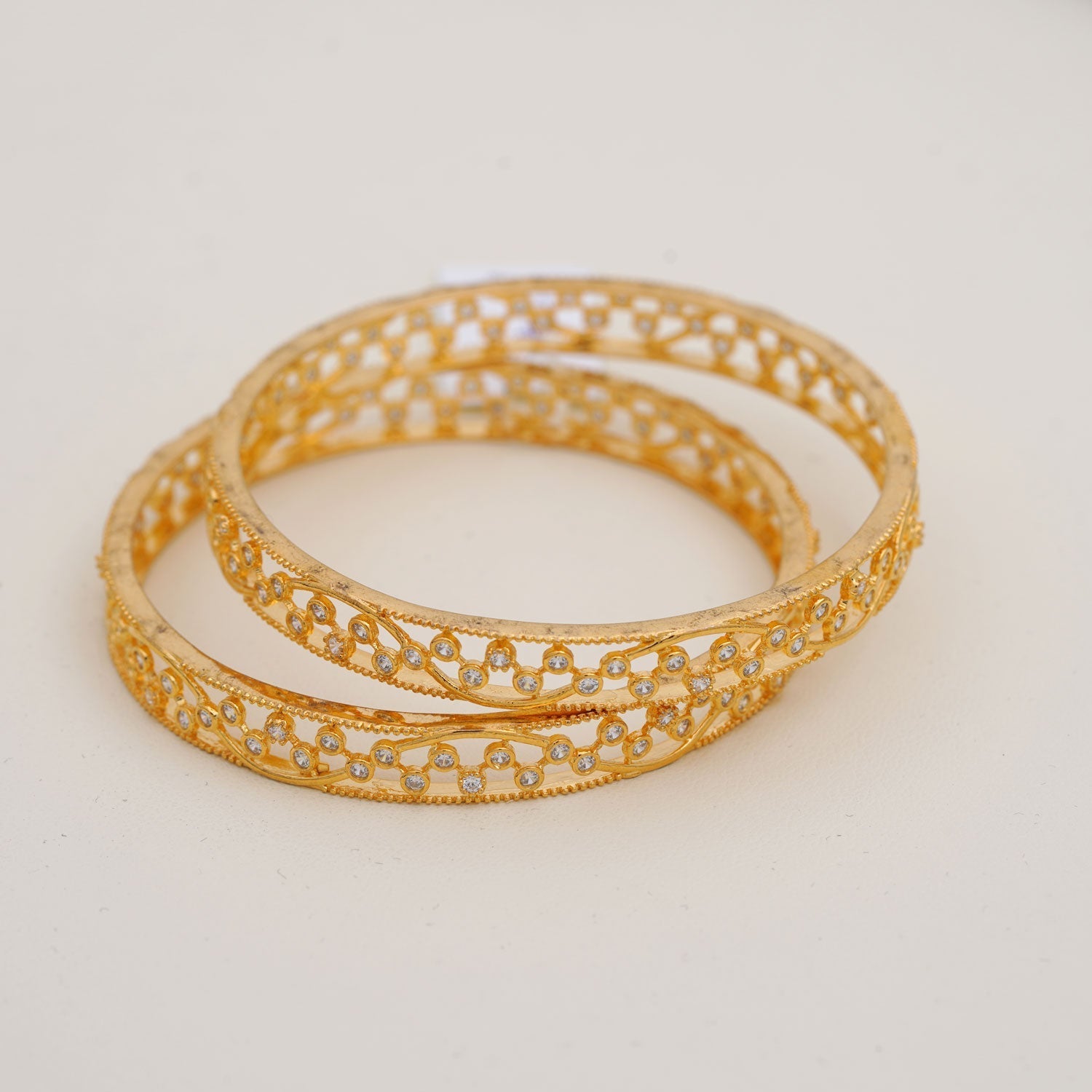 Glistening 92.5 Sterling Silver with Gold polish Bangles Ivanah Silver