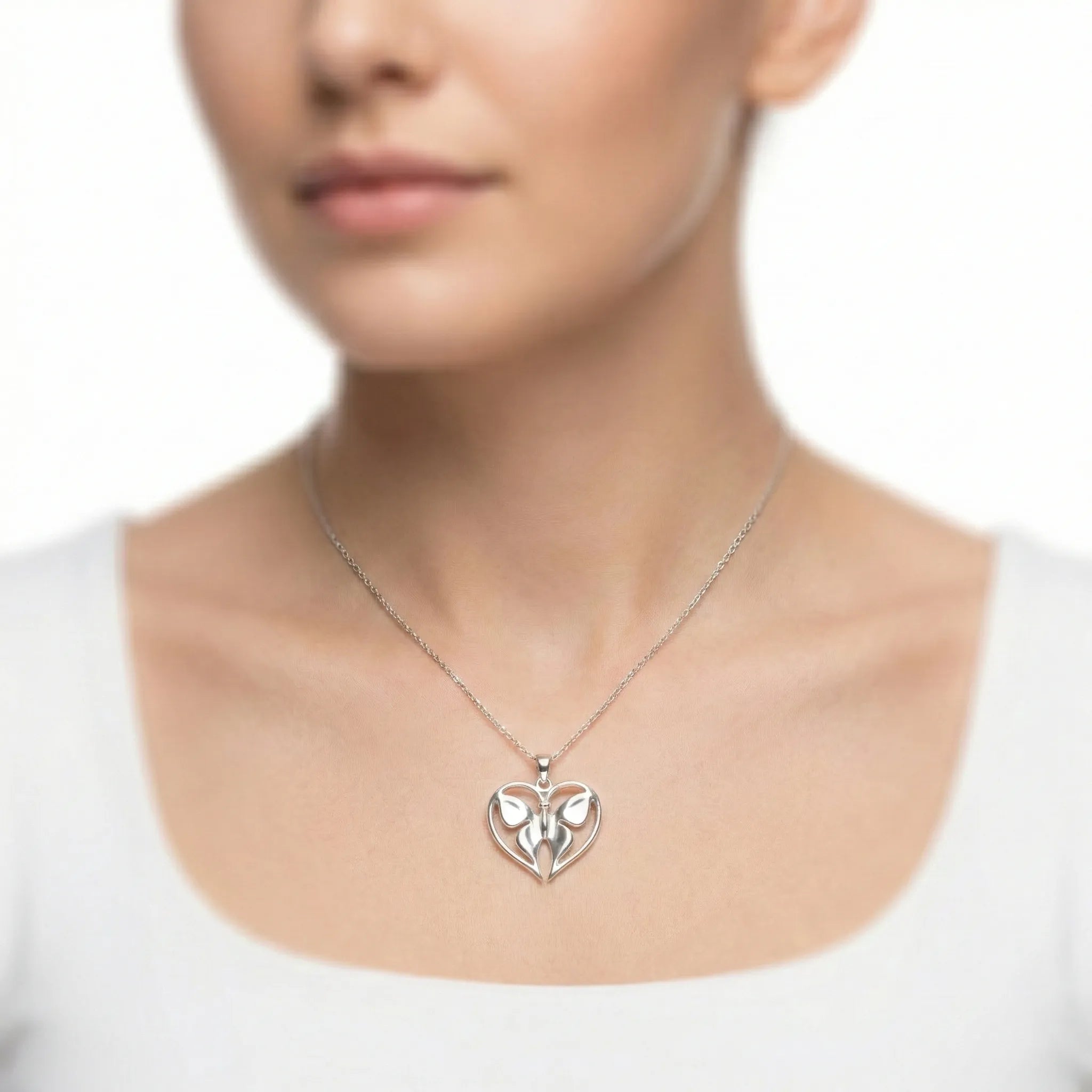 92.5 Sterling Silver Butterfly in Heart Pendant Ivanah Silver