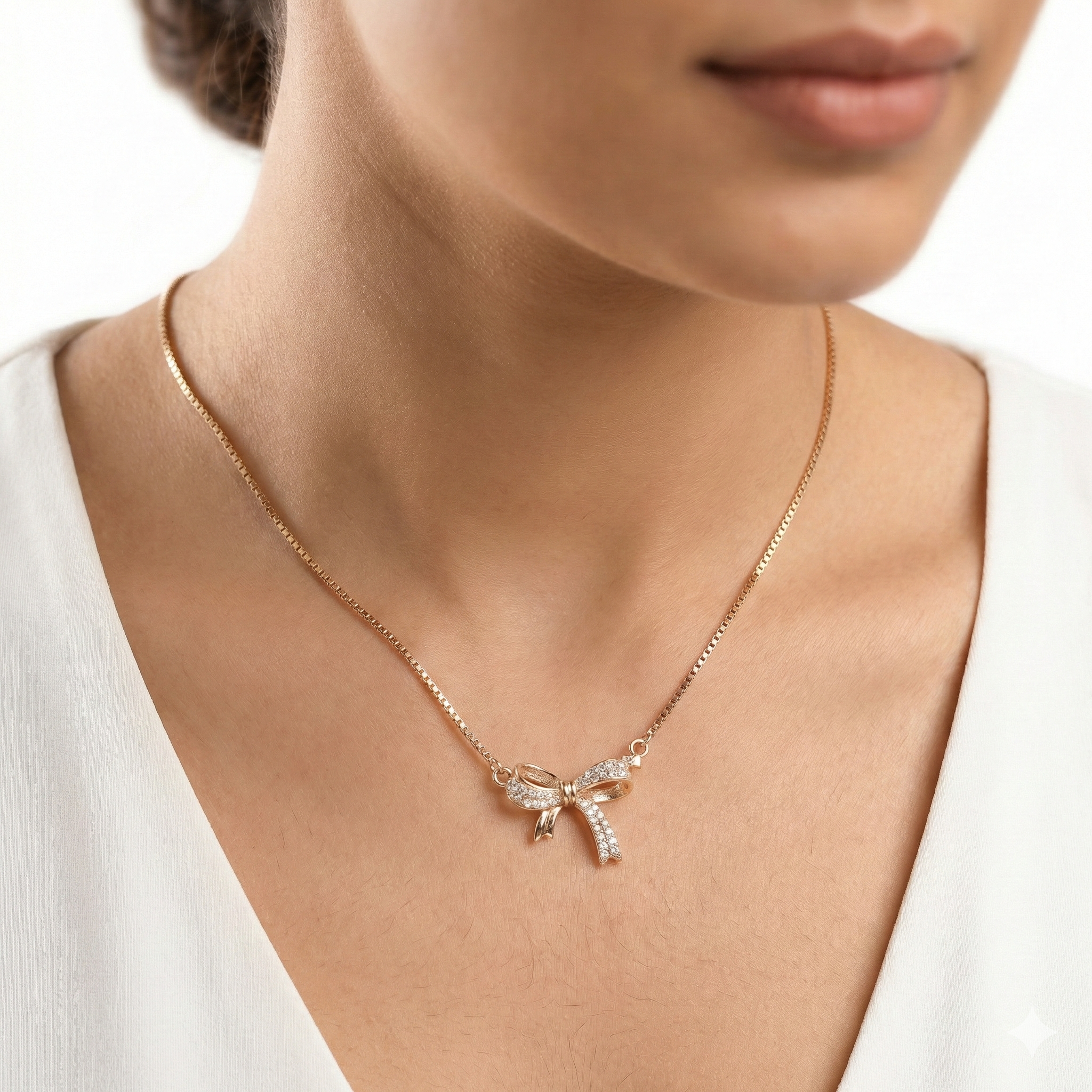 92.5 Silver Rose Gold Plated Sparkling Bow Pendant with chain Ivanah Silver
