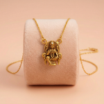 Traditional Seated Lakshmi Gold Pendant with Stone Accent Ivanah Silver