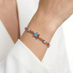 92.5 Sterling Silver with Rose Gold Polished Charm Butterfly bracelet Ivanah Silver